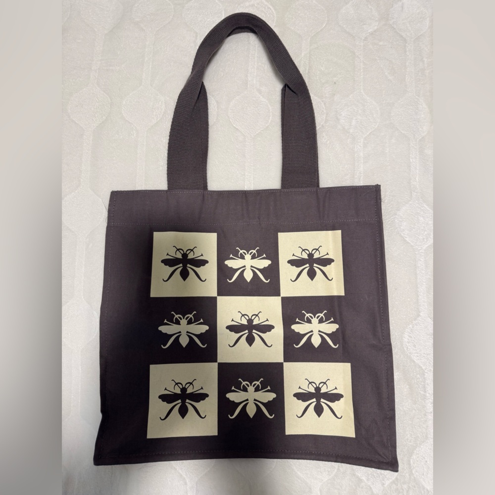 Barnes & Noble Paper Source Canvas Organic Cotton Tote Bag with a firefly